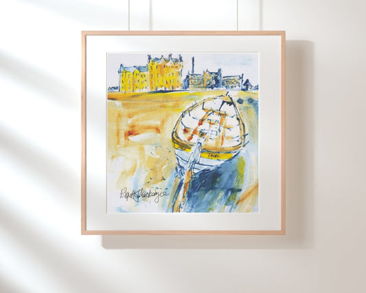 Rowing boat on beach and buildings