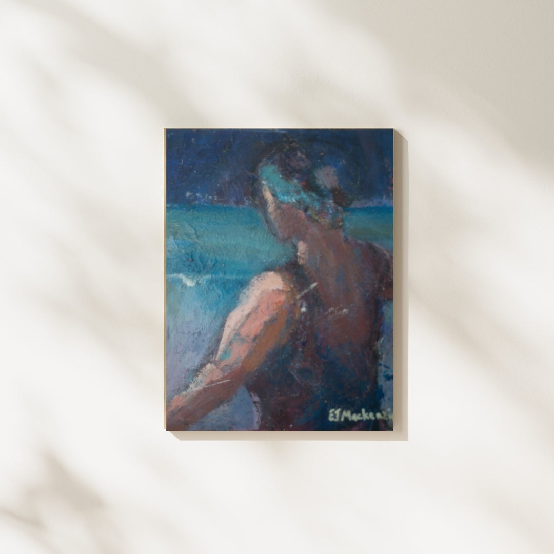 An impressionistice painting of lone figure by the sea hanging on wall