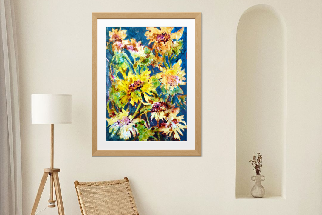 Yellow floral painting on white wall with lamp and chair