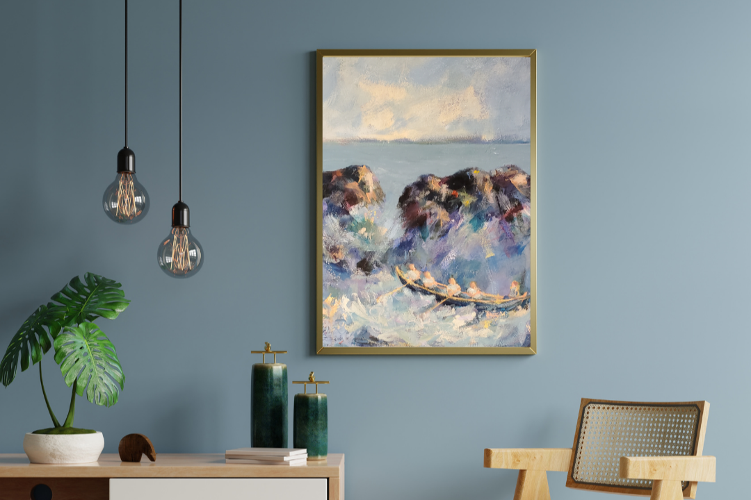 Impressionistic coastal painting on wall with desk, chair and plants